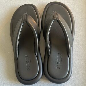 Pieces brand synthetic very durable leather flip flop in black.  New in bo